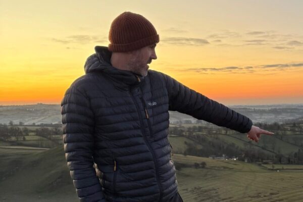 sunrise peak district - person pointing - corporate events in the peak district